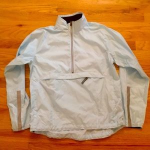 Vintage Nike half zip pullover wind shell. M light blue. Zip kangaroo pocket.